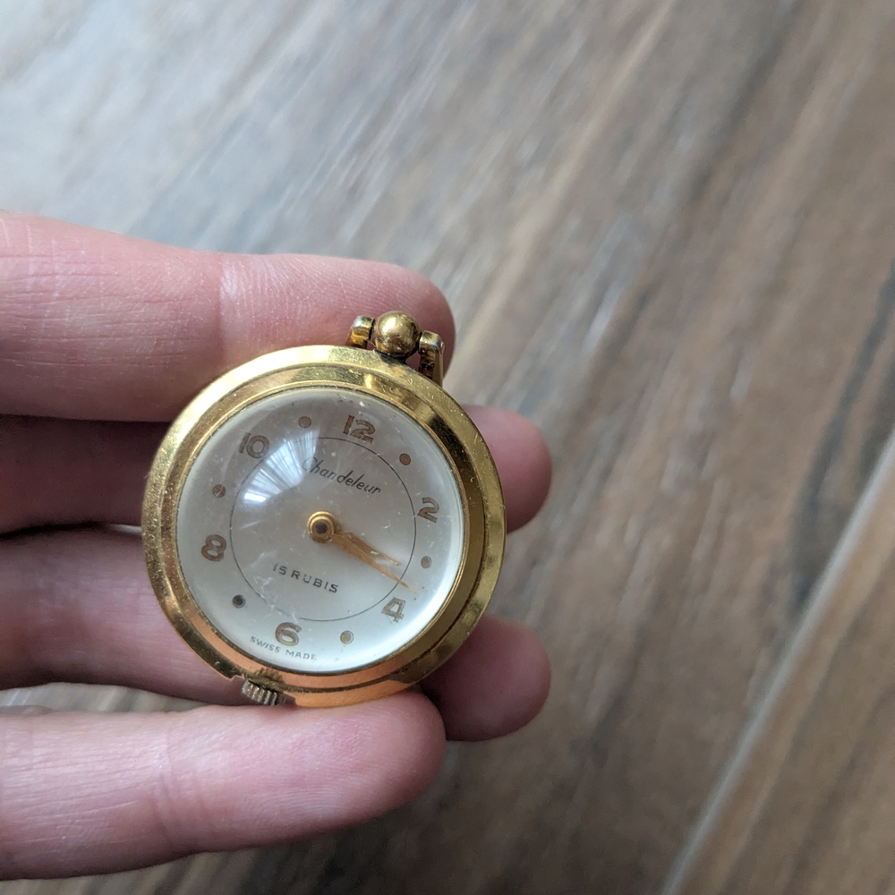 Gold Pocket Watch with White Dial
